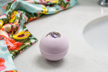 Load image into Gallery viewer, Bath bomb sitting next to bathroom sink